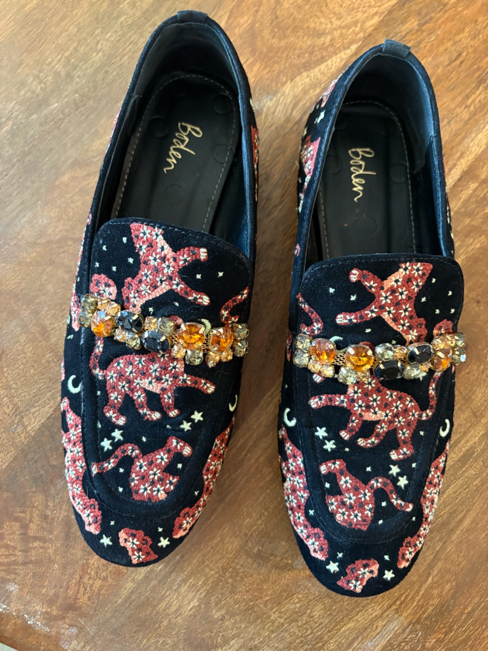 Women’s Black Suede Loafers with whimsical leopards and gems.